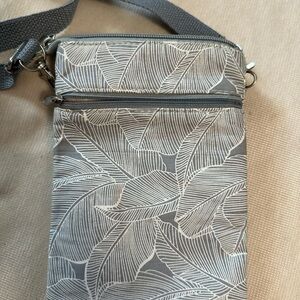 Grey and white flowered crossbody bag
